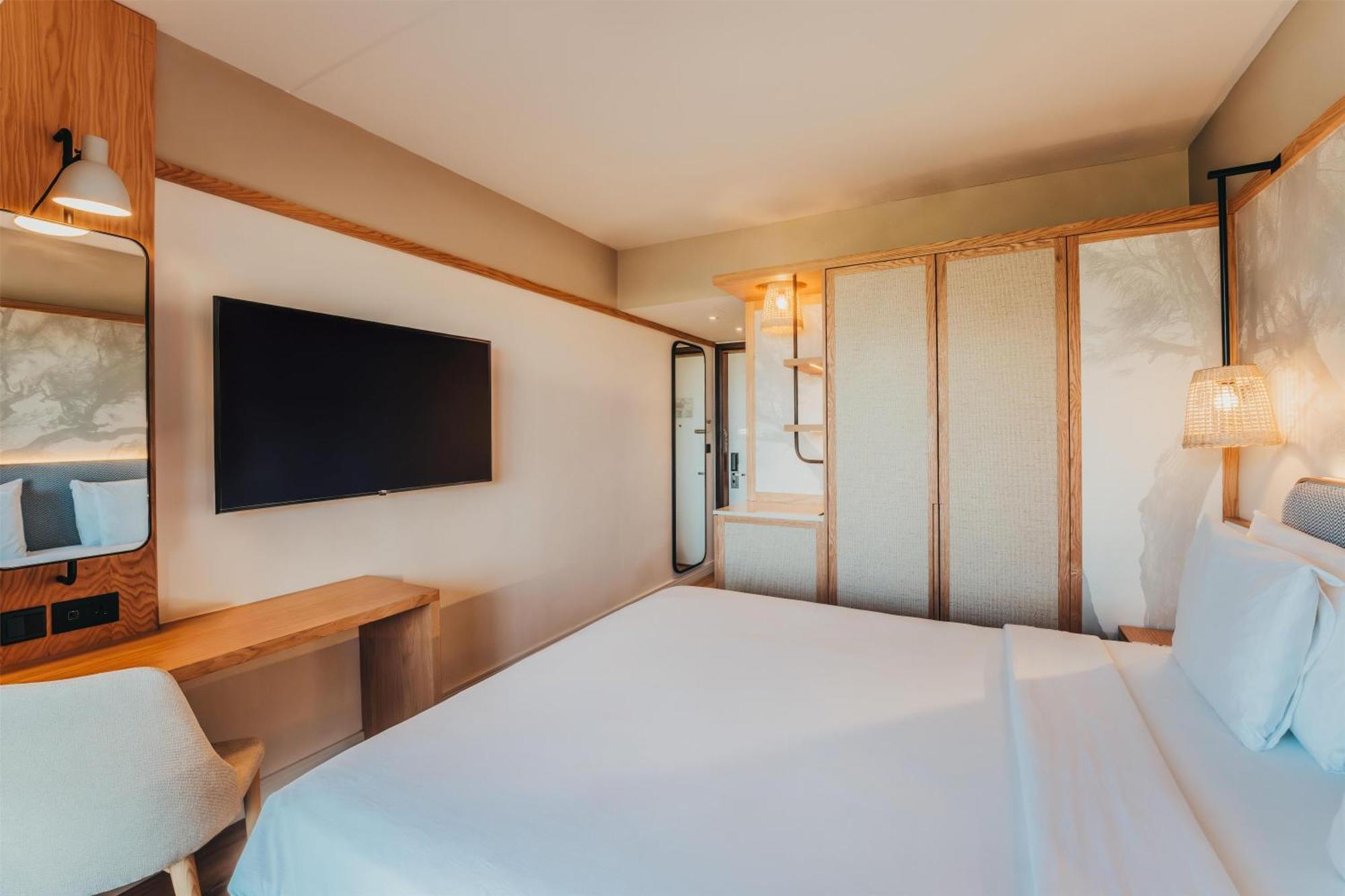 Superior Zimmer mit Kingsize-Bett und Zugang zum Strand